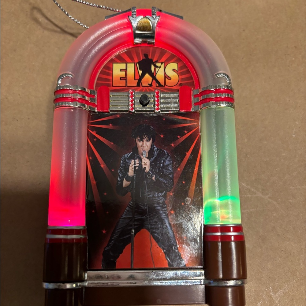 Elvis Presley light up. Plays all shook up.